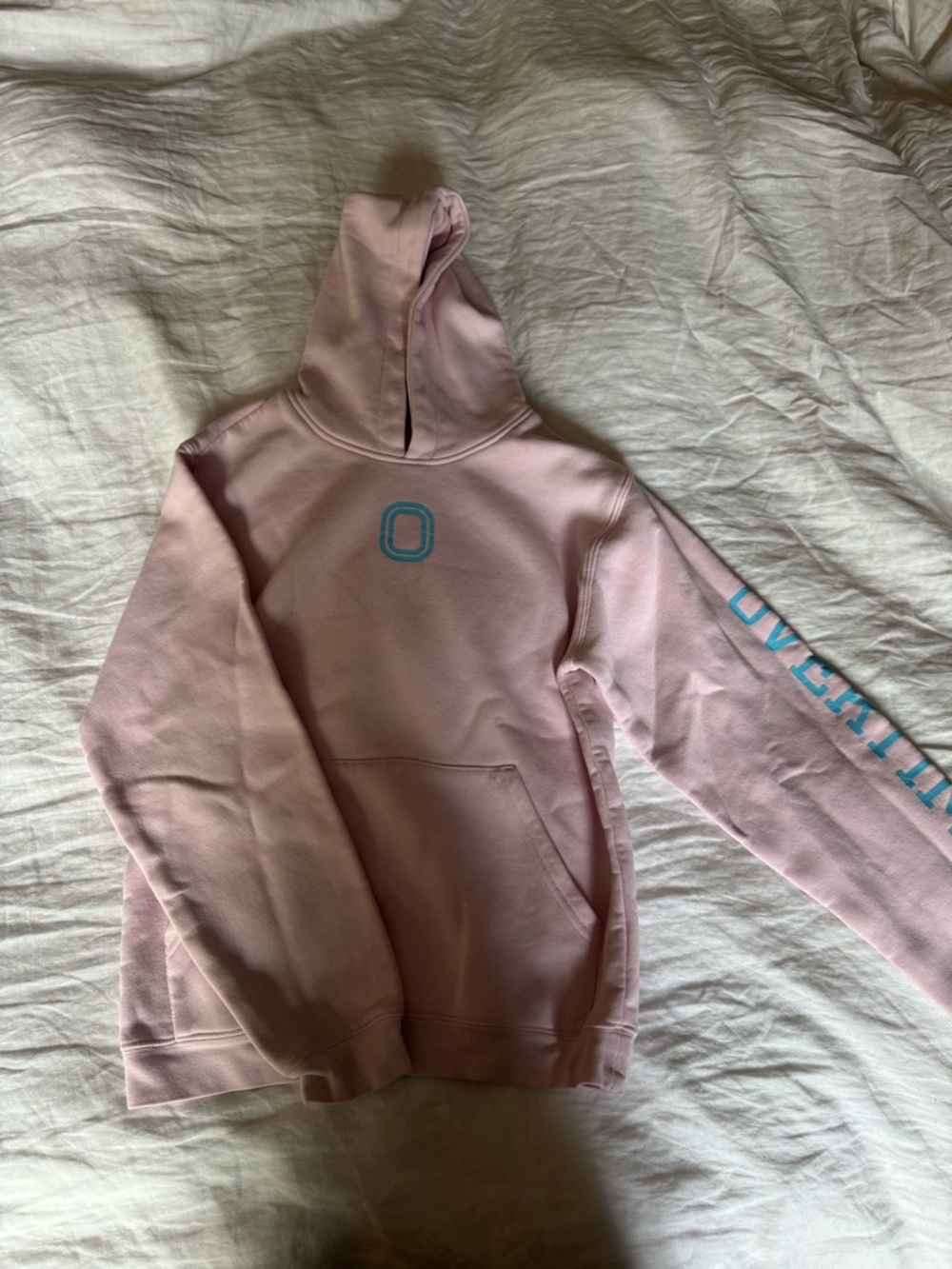 Overtime Light Pink Hoodie with Blue 'O' and Sleeve Text youth large